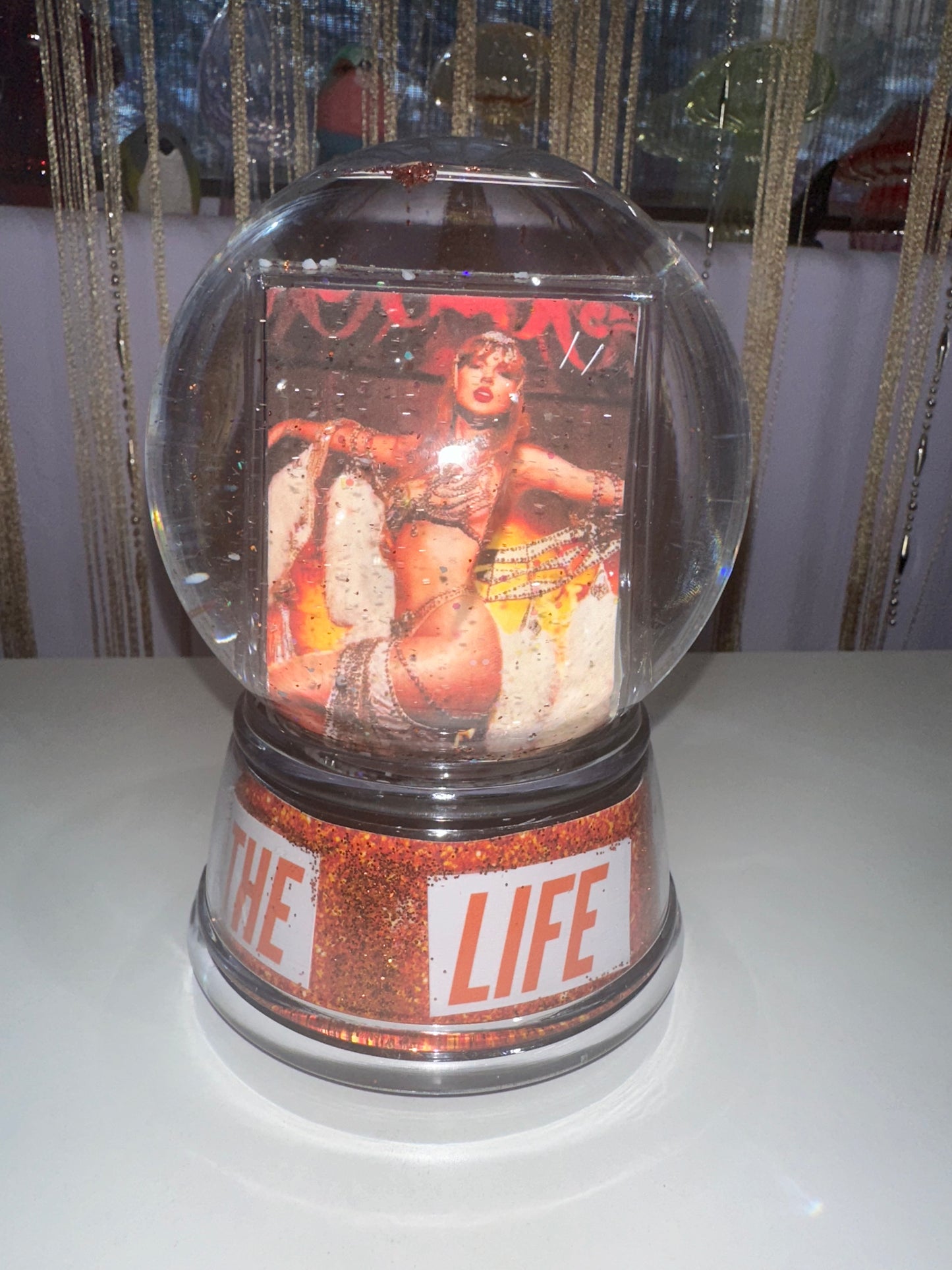 Orange Glitter Snow globe