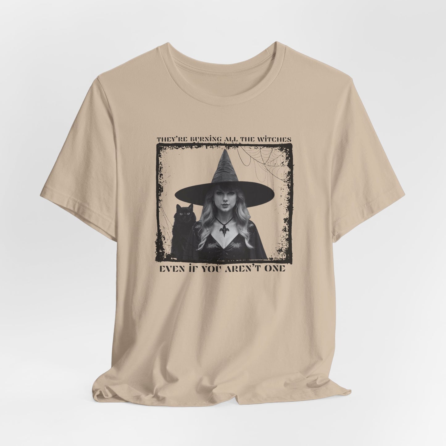 they're burning all the witches even if you aren't one - Unisex Jersey Short Sleeve Tee