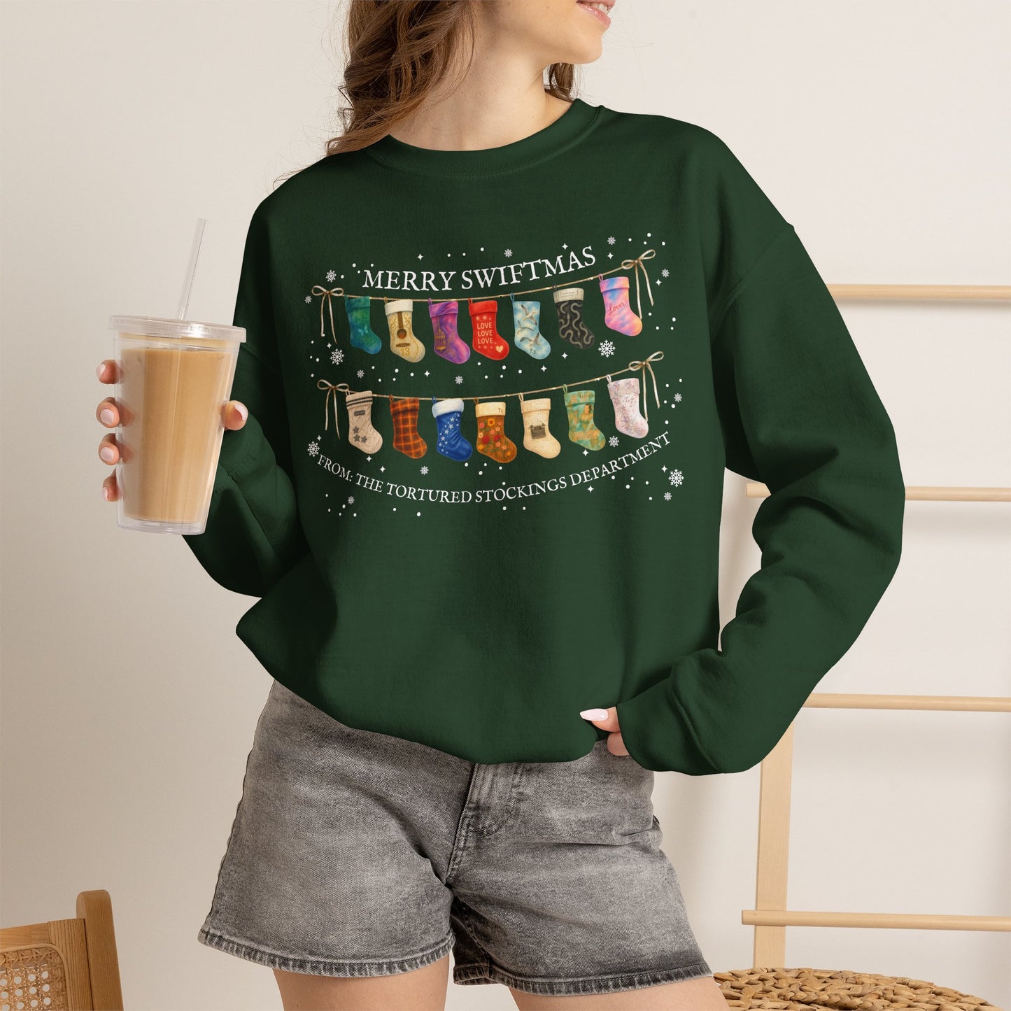 The Tortured Stockings Department Crewneck Sweatshirt — “Merry Swiftmas” Holiday Sweater