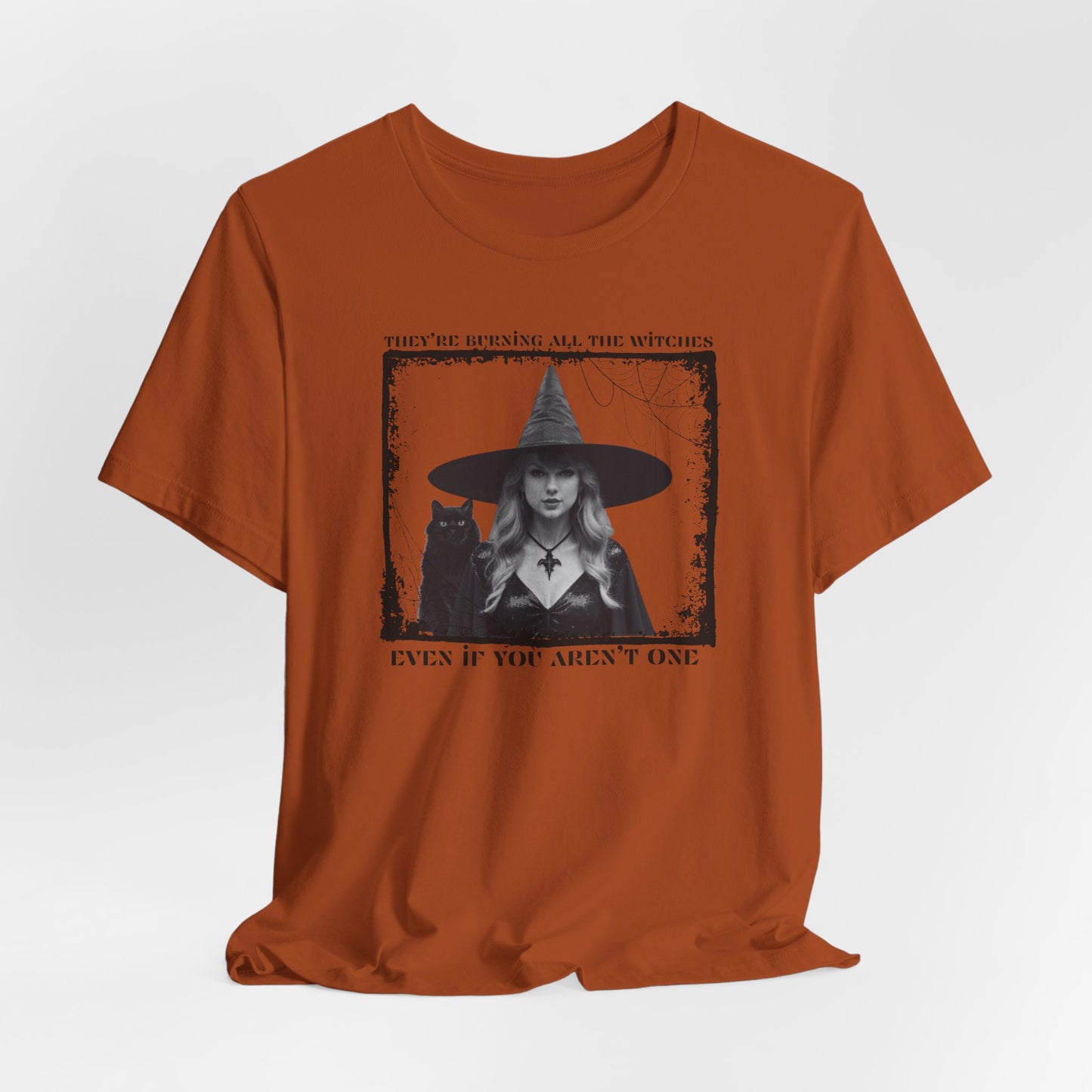 they're burning all the witches even if you aren't one - Unisex Jersey Short Sleeve Tee