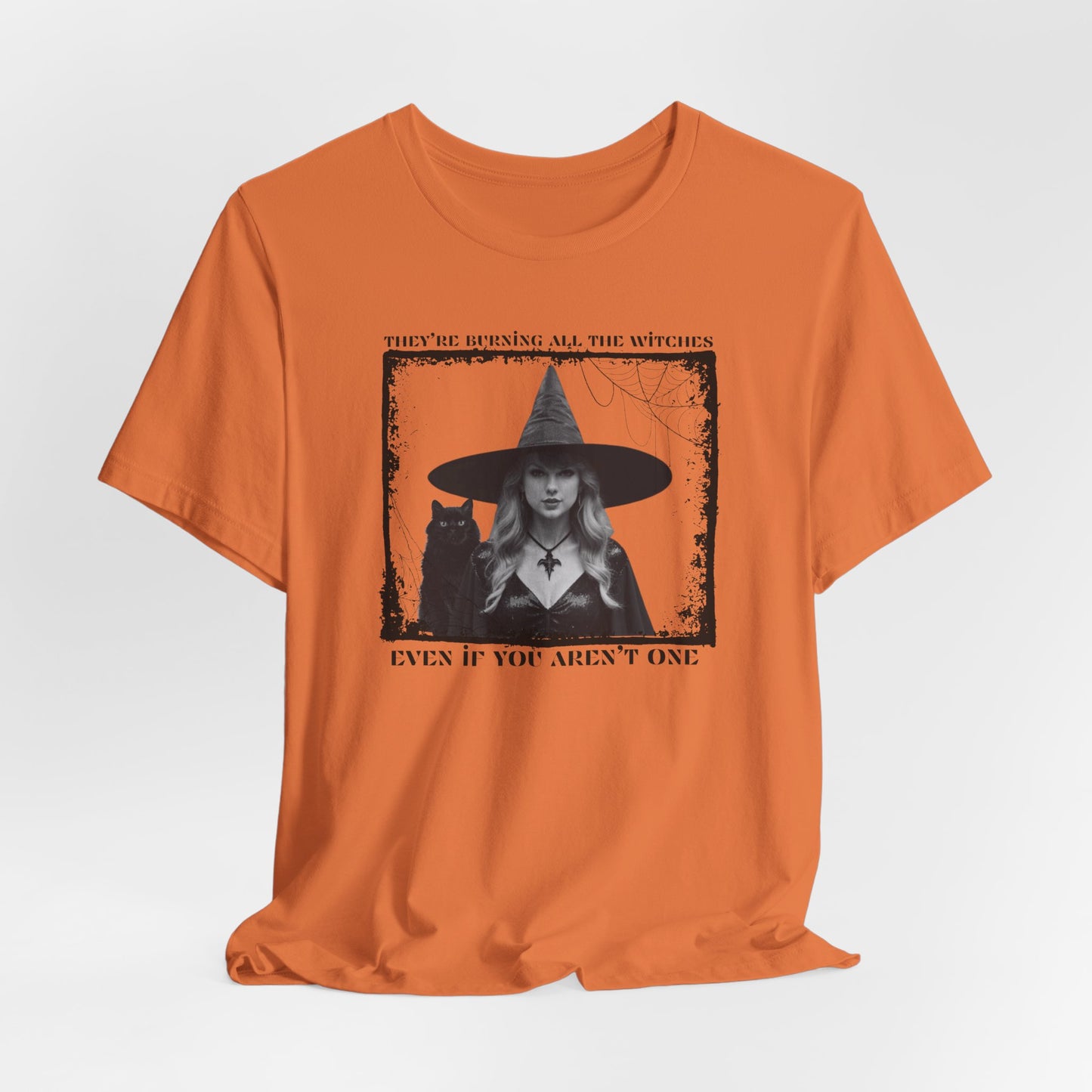 they're burning all the witches even if you aren't one - Unisex Jersey Short Sleeve Tee